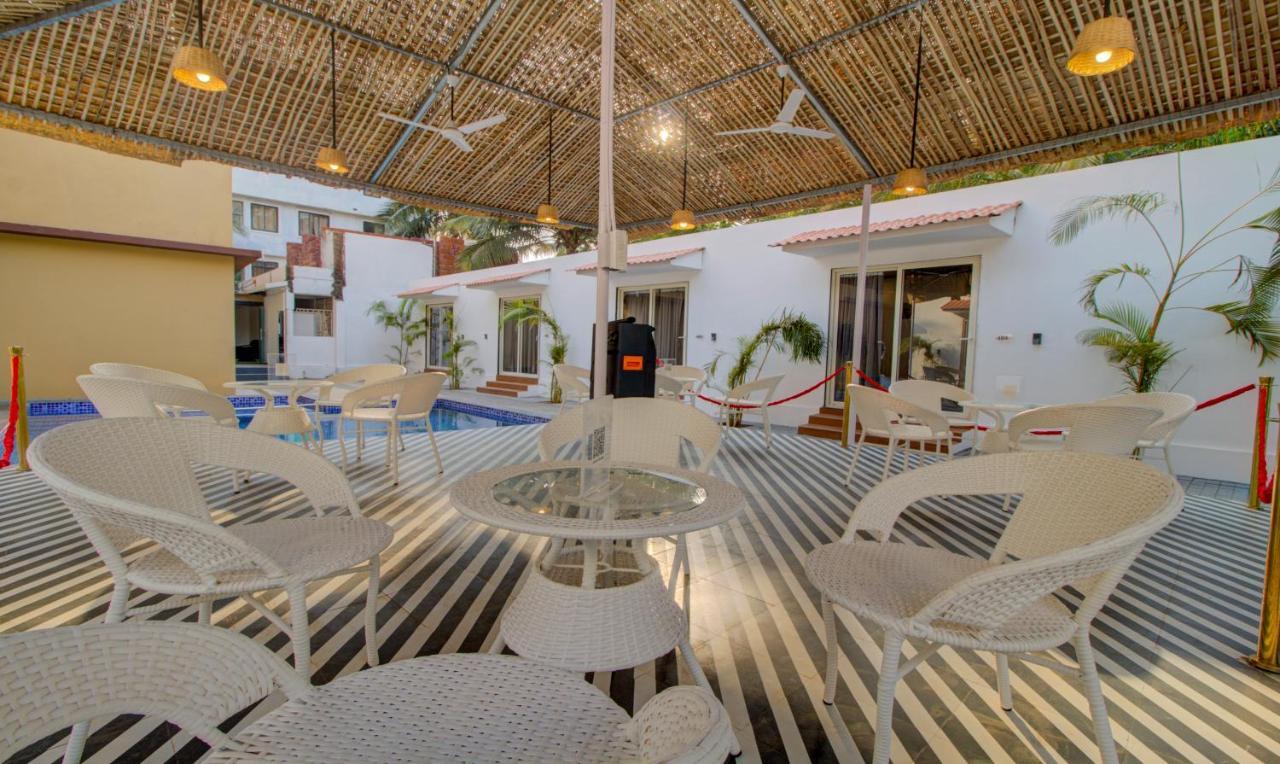 Treebo Code Red Otel Morjim Dış mekan fotoğraf