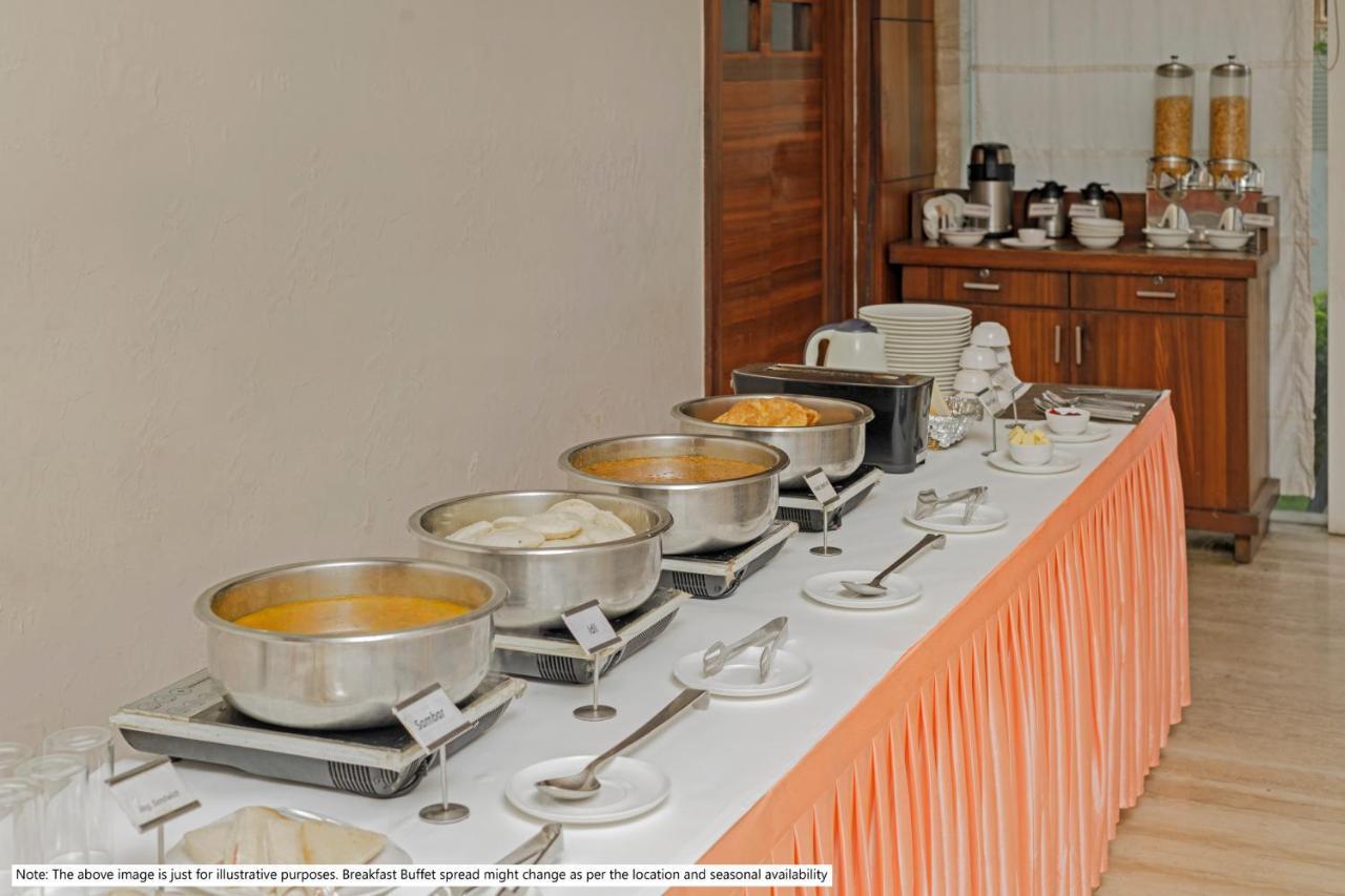Treebo Code Red Otel Morjim Dış mekan fotoğraf